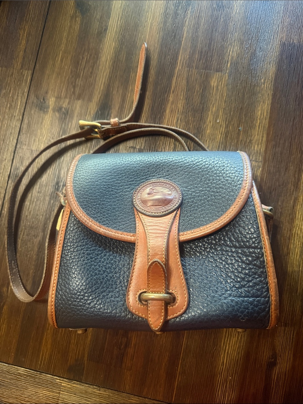 Dooney & Bourke Navy Pebbled Leather Crossbody with Brown Trim